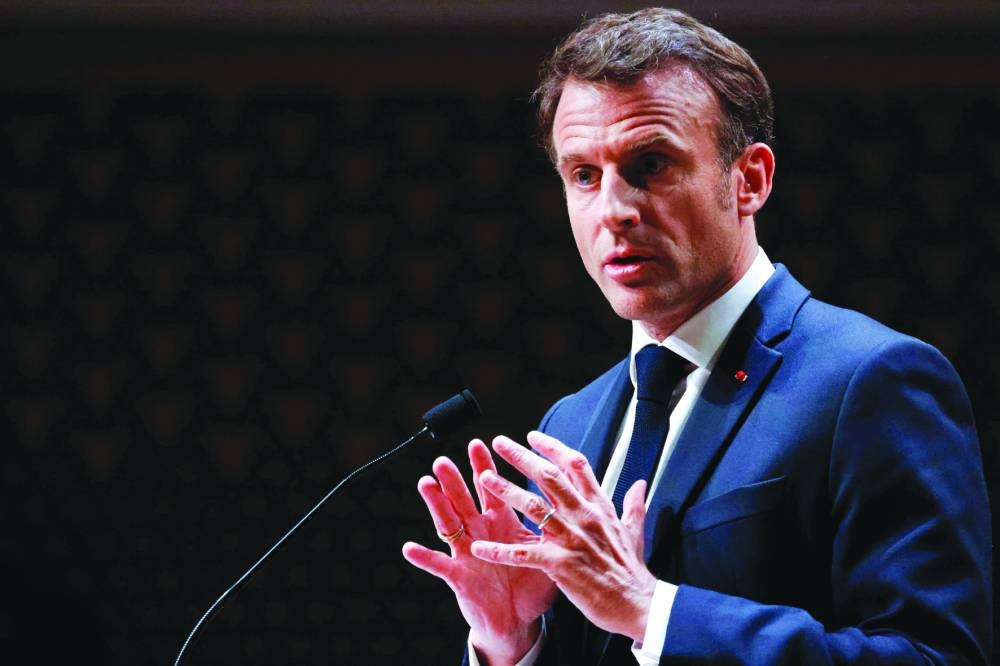 French President Emmanuel Macron delivers a speech to the Nexus Institute in the Amare theatre in The Hague yesterday as part of a state visit to the Netherlands.