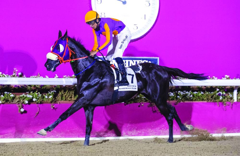 Anas al-Seyabi guides Mutahaffiz to Al Mafiar Cup win at Al Rayyan Racecourse on Thursday. PICTURES: Juhaim