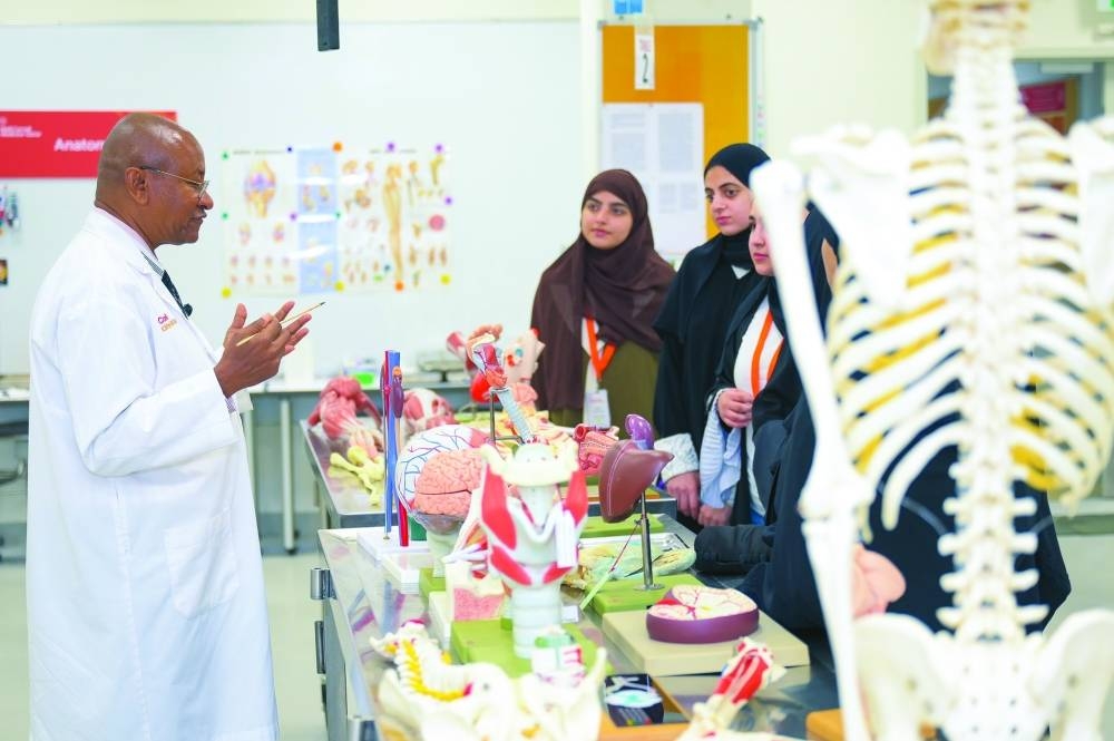 Dr Avelin Malyango, assistant professor of anatomy in radiology, speaking to students.