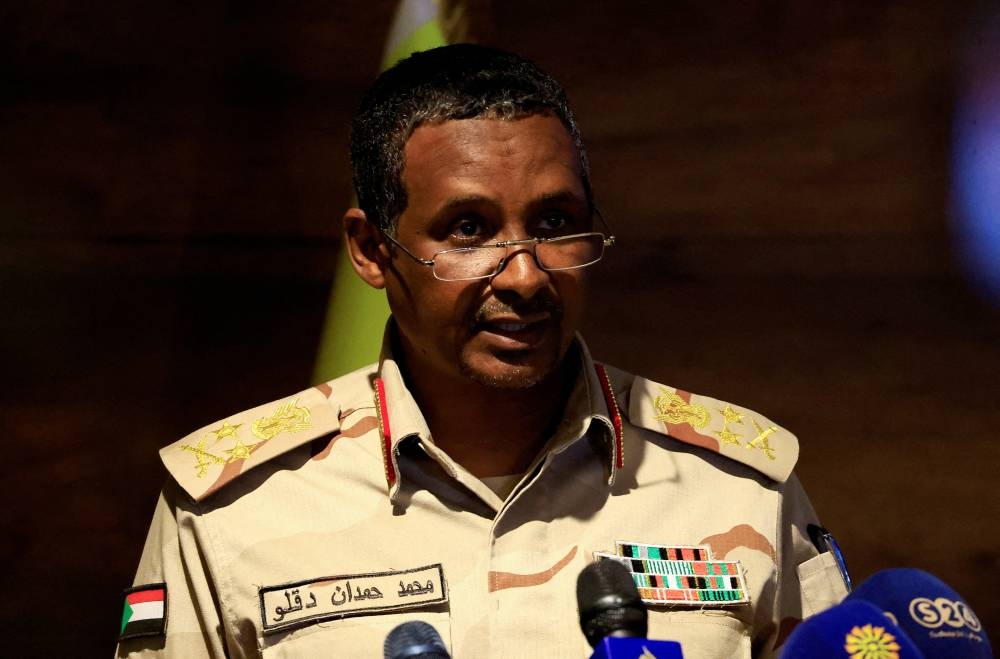 FILE PHOTO: Deputy head of Sudan's sovereign council General Mohamed Hamdan Dagalo speaks during a press conference at Rapid Support Forces head quarter in Khartoum, Sudan February 19, 2023. REUTERS