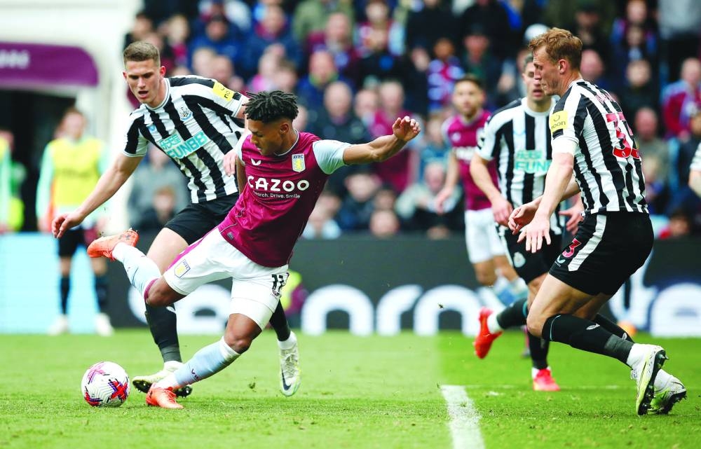 Ollie Watkins (centre), who has now scored 11 goals in 12 matches, netted twice in Aston Villa’s win over Newcastle on Saturday. (Reuters)