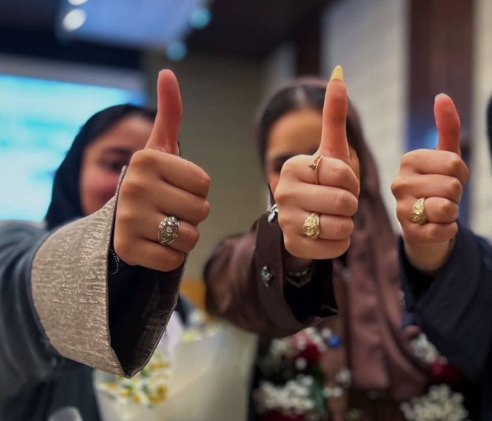 Aggies display their Aggie Ring