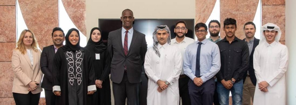 US ambassador Timmy T Davis with a group of Tamuq students.