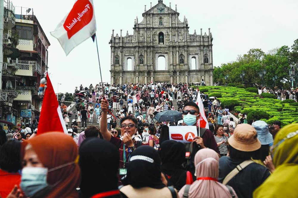 A view of visitors in front of the ruins of Saint Paul's during Labour Day holiday in Macau, China, yesterday.