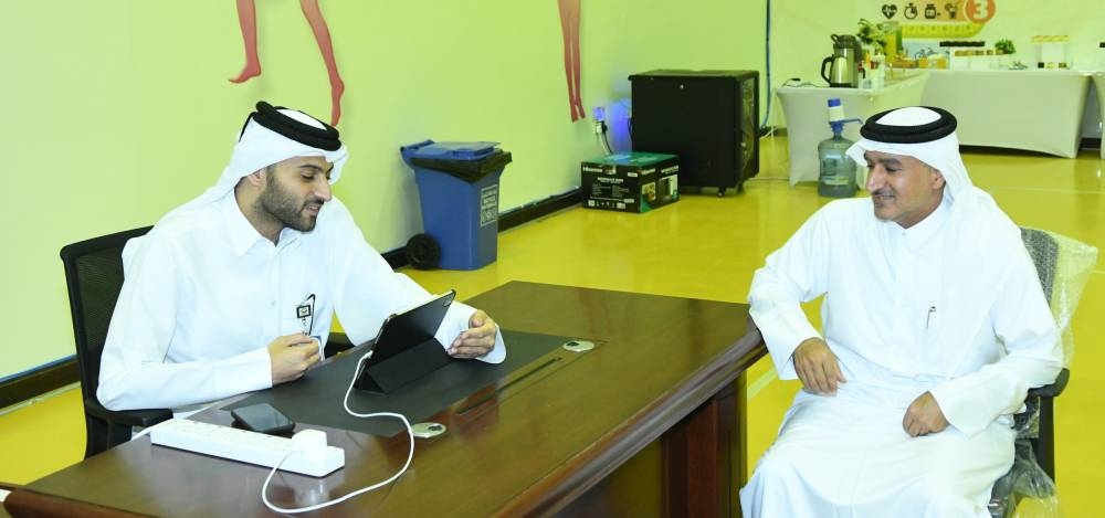 Glimpses from the registration process Sunday. PICTURES: Ram Chand, Shemeer Rasheed and QNA