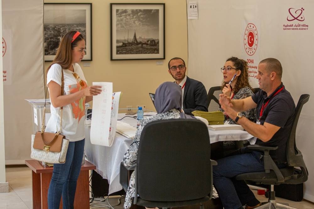 Turkish voters living in Qatar headed to the polls Monday to cast their votes