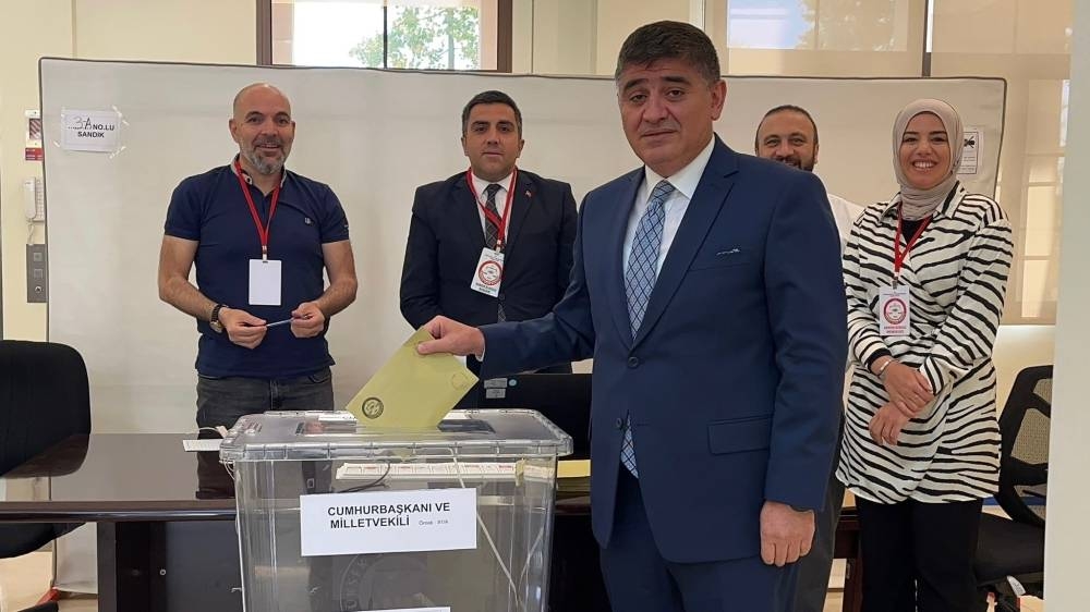Turkish ambassador Dr Mustafa Goksu and others during voting at the Turkish embassy.
