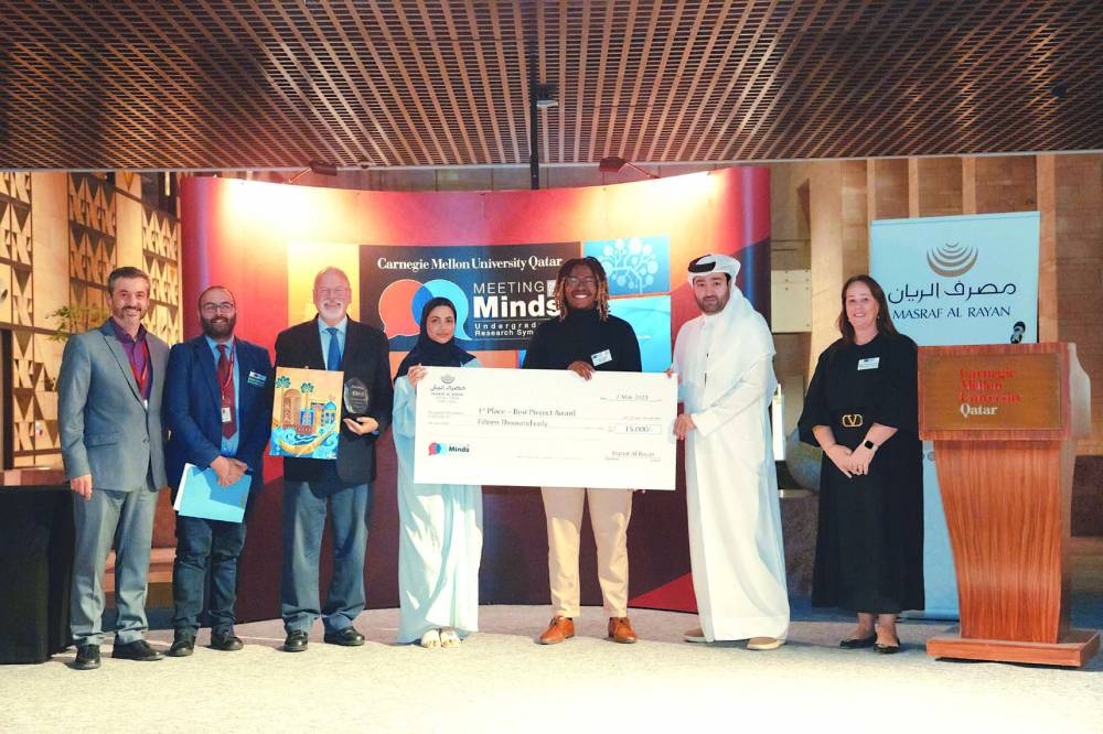 The top prize winner being feted.