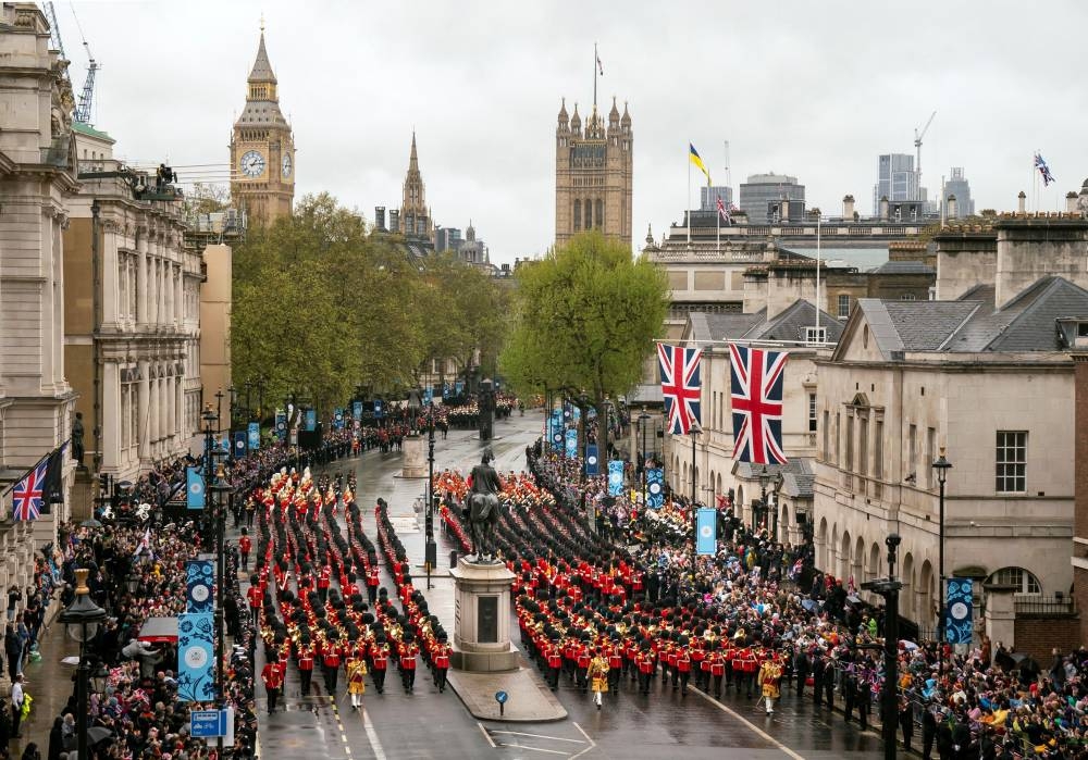 The Coronation Procession passes along Whitehall to Buckingham Palace following the coronation ceremony of King Charles III and Queen Camilla in central London.  REUTERS