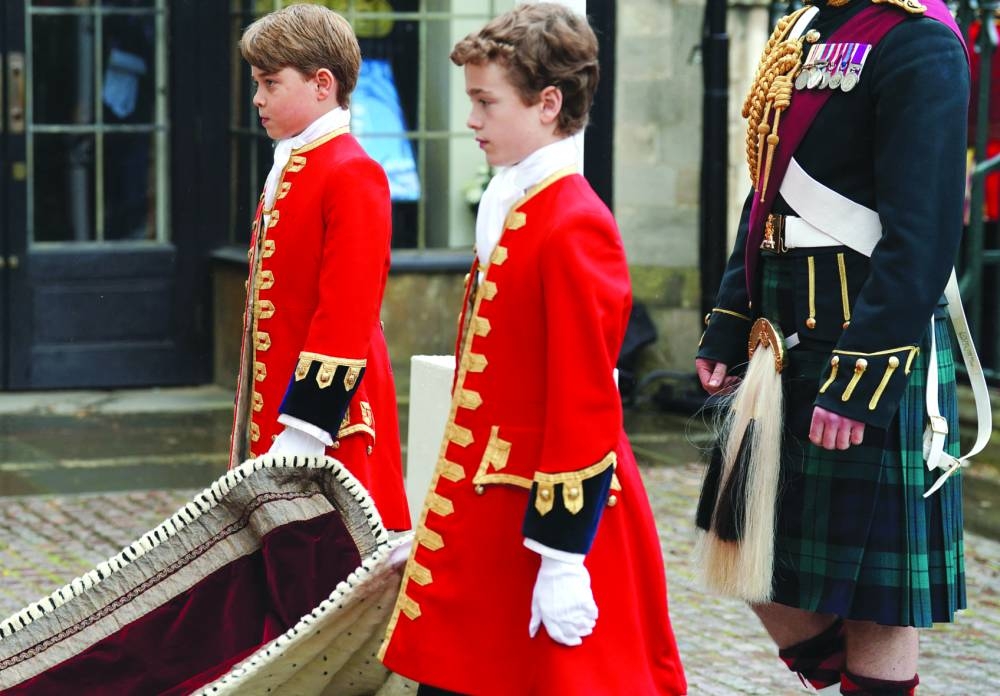 Prince George, one of four Pages of Honour, at Westminster Abbey, central London.