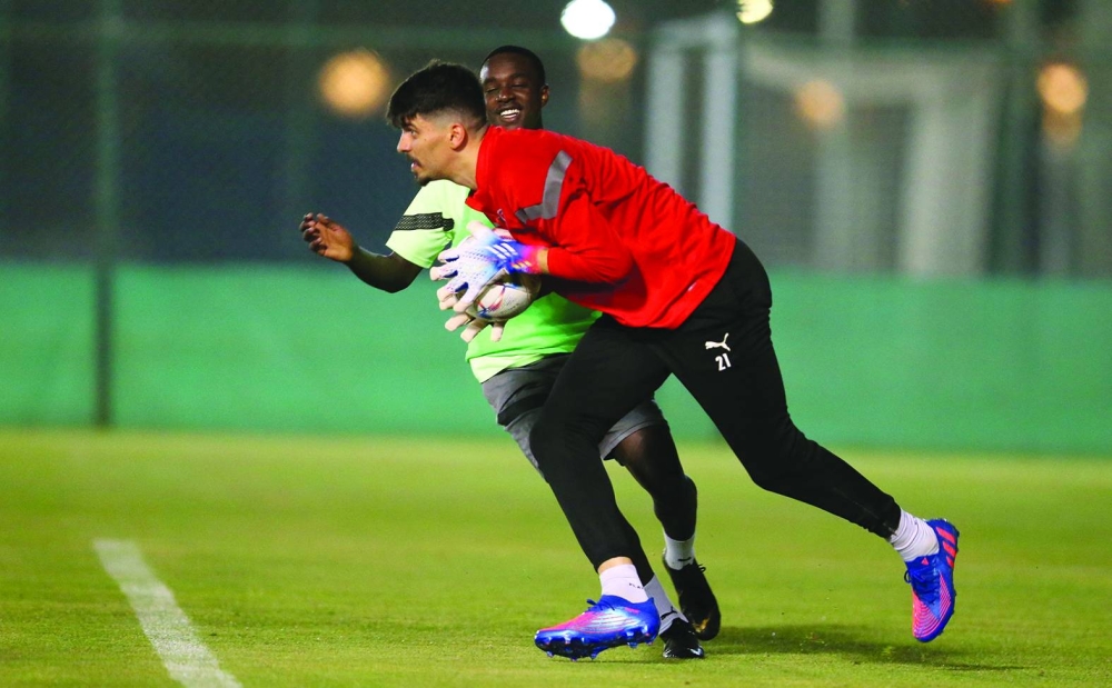 Al Duhail players seen during separate training sessions ahead of today’s final round of QNB Stars League matches.