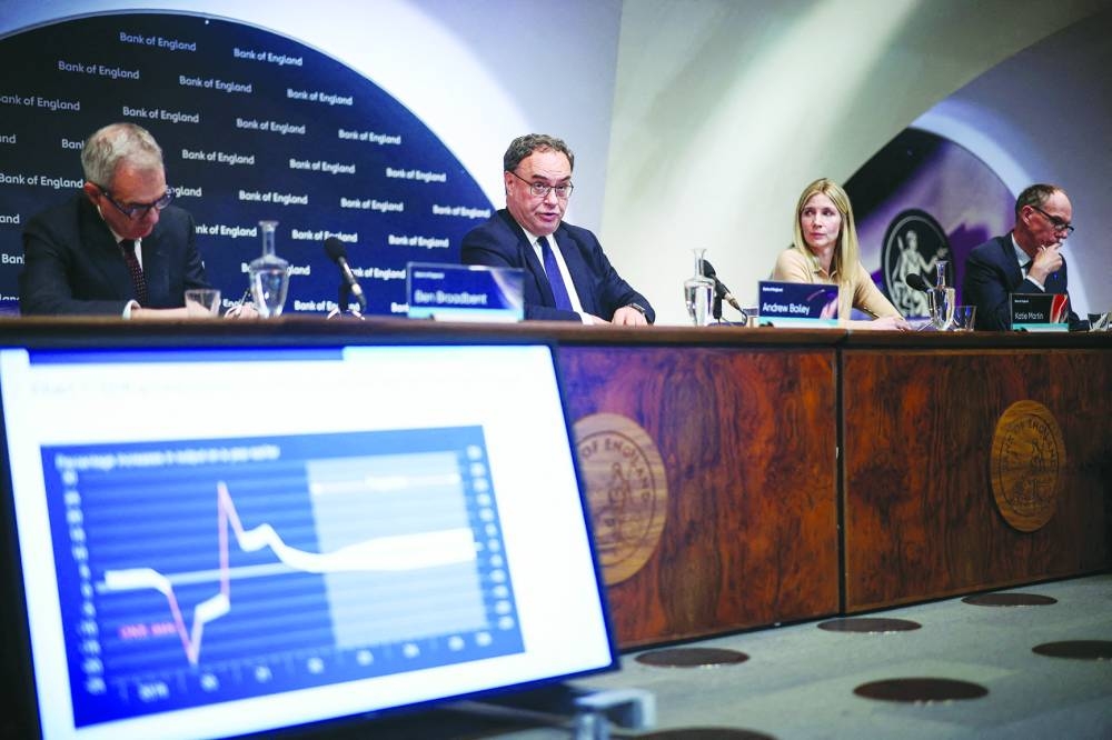 From left: The Bank of England's deputy governor, Monetary Policy, Ben Broadbent; governor Andrew Bailey, Head of Media and Stakeholder Engagement Katie Martin and deputy governor, Markets and Banking, Dave Ramsden address the media during the Monetary Policy Report press conference at the Bank of England, in London yesterday. The BoE hiked the rate by a quarter-point to 4.5% — its 12th increase in a row with UK annual inflation stuck above 10%, fuelling a cost-of-living crisis across Britain.