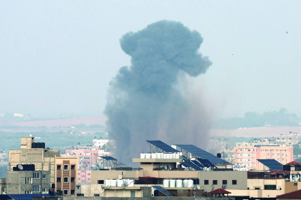 
Smoke rises following an Israeli strike, in Gaza.  
