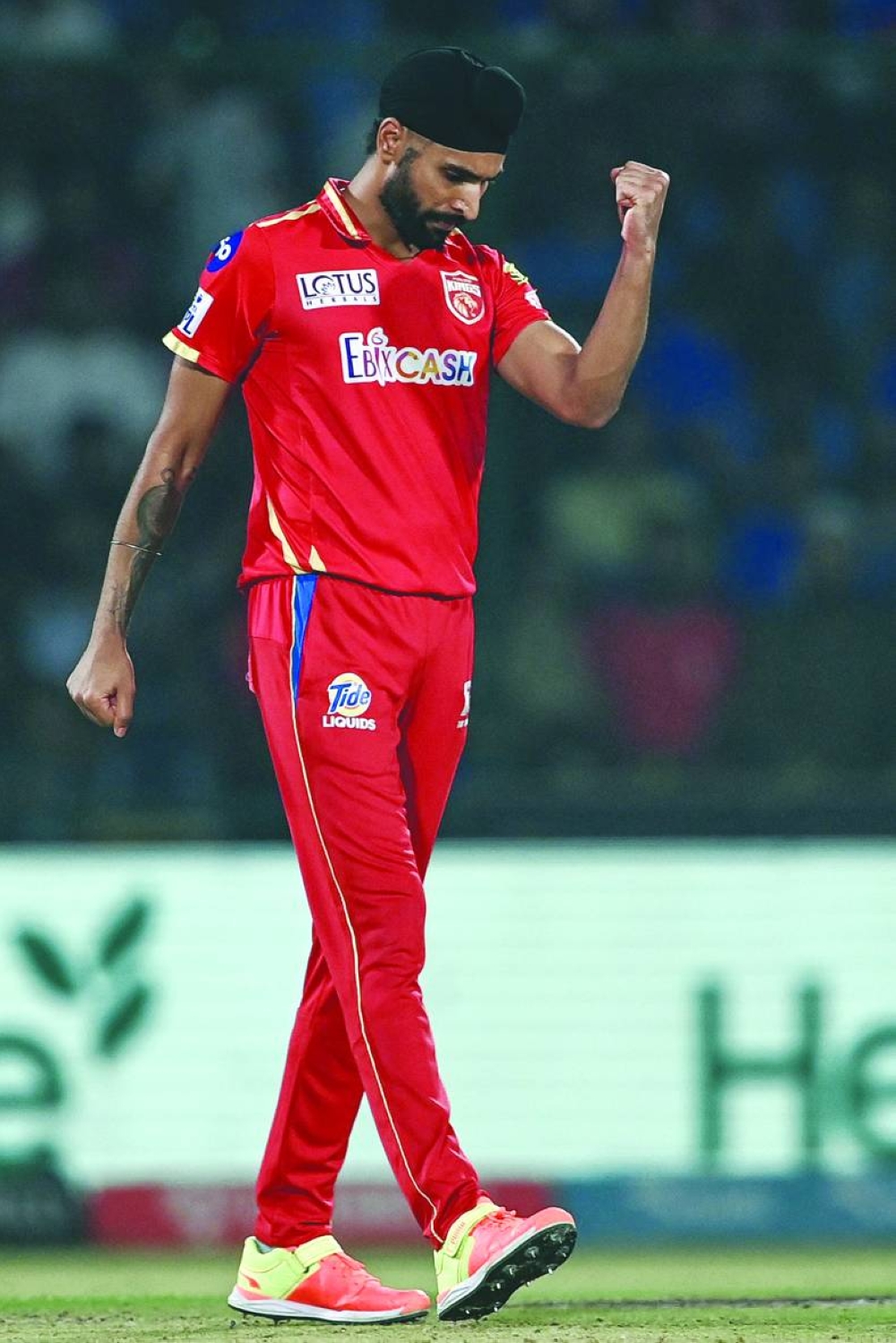 Punjab Kings’ Harpreet Brar celebrates after taking the wicket of Delhi Capitals’ Phil Salt (not in picture) on Saturday. (AFP)