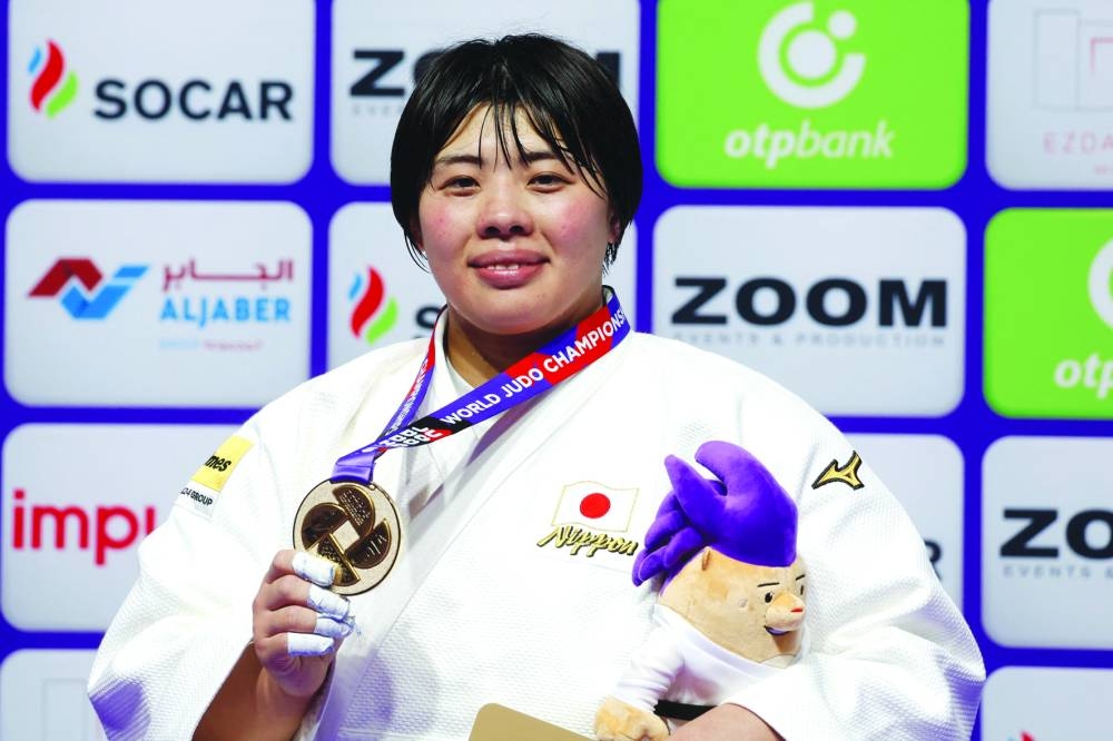 
Japan’s Akira Sone poses with her women’s +78Kg gold medal at the Ali Bin Hamad Al Attiyah Arena. (AFP) 