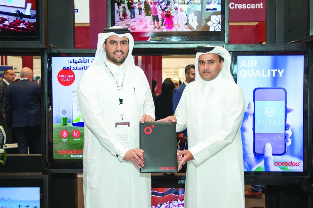 Thani al-Malki and Salem al-Mohannadi at the partnership announcement.