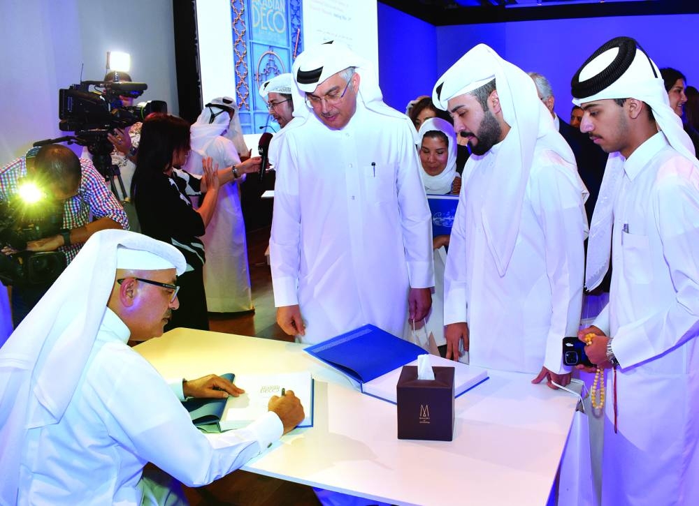 Page 1

Architect Ibrahim Mohamed Jaidah signing his latest book, 'Discovering Arabian Deco, Early Modern Architecture in Qatar,' at the launch event. PICTURE: Thajudheen.