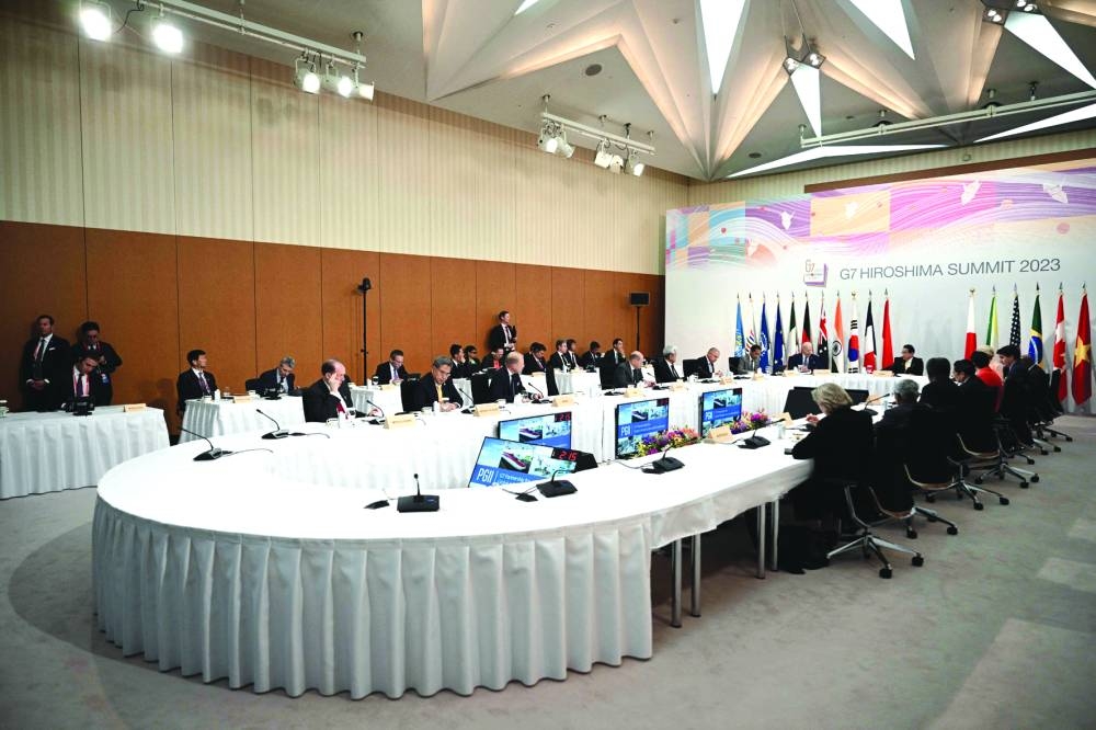 
US President Joe Biden, Japan’s Prime Minister Fumio Kishida and other world leaders take part in a Partnership for Global Infrastructure and Investment event during the G7 Leaders’ Summit in Hiroshima. 
