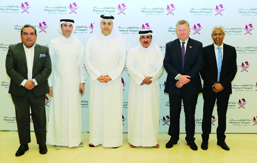 Mwani Qatar CEO Captain Abdulla Mohamed al-Khanji and Group CEO of QTerminals Neville Bissett, along with officials of Mwani Qatar and QTerminals after receiving the honour from Minister of Transport HE Jassim Seif Ahmed al-Sulaiti for Hamad Port&#039;s consistent performance.