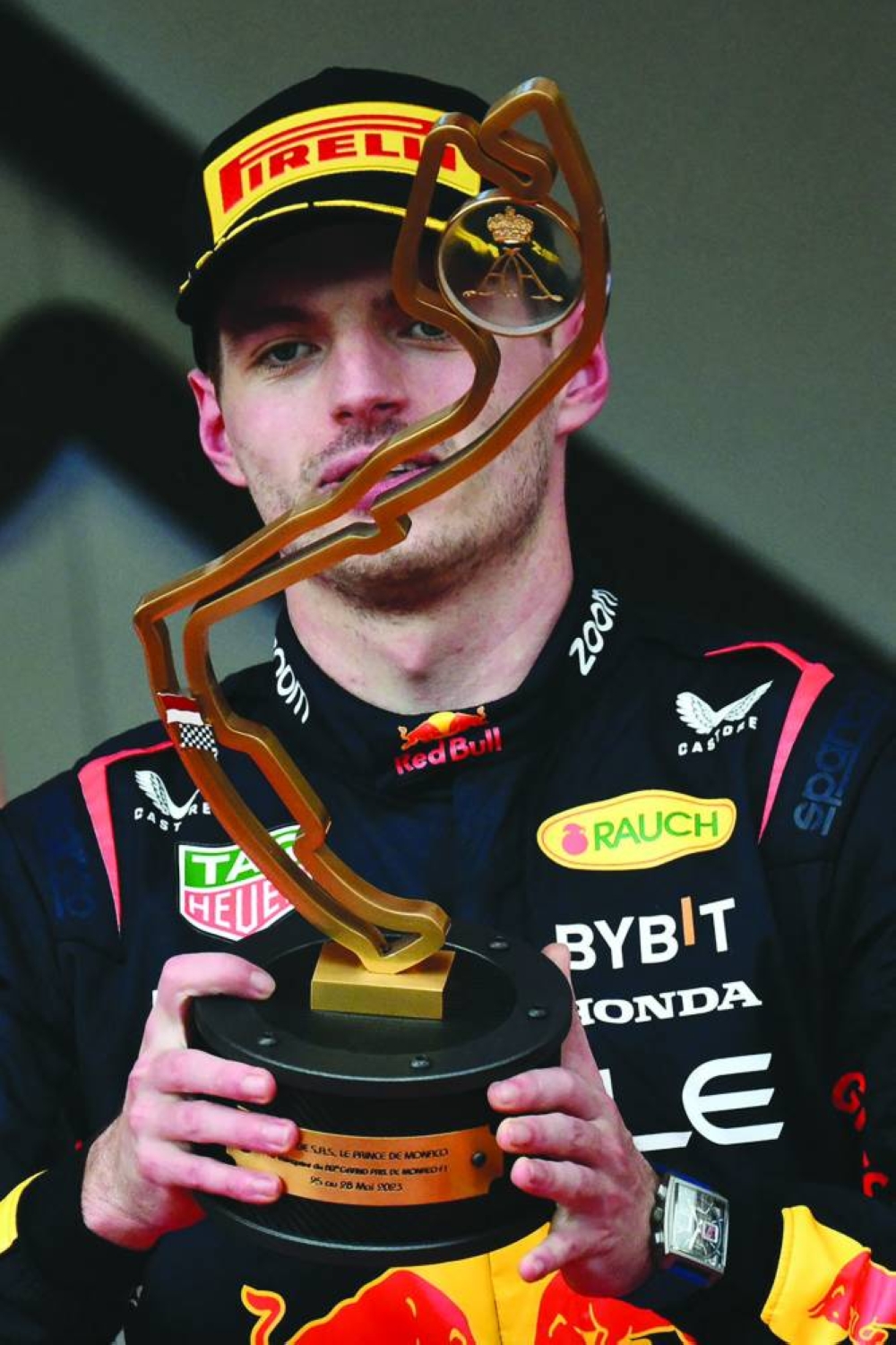 Red Bull Racing's Dutch driver Max Verstappen poses with his trophy on the podium after winning the Formula One Monaco Grand Prix at the Monaco street circuit in Monaco on Sunday. (AFP)