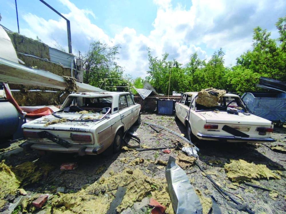 Cars at a compound of a petrol station heavily damaged by an aerial bomb during a Russian air strike in the town of Toretsk, Donetsk region, Ukraine on Monday. (Reuters)