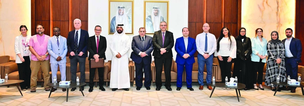 QU and Ebn Sina Medical Company officials at the MoU signing ceremony.