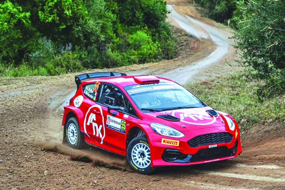 Qatar's Nasser bin Khalifa al-Atya and Italian co-driver Bernacchini Giovanni drive their Ford Fiesta during the first Special Stage 1 of the Rally of Italia Sardegna on Thursday.