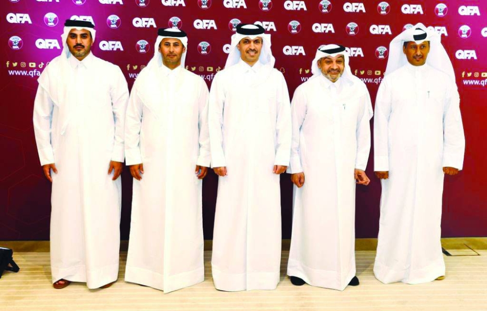 
Newly-elected Qatar Football Association president Jassim bin Rashid al-Buenain (centre) poses with executive committee members Hani Talib Ballan, Mohamed Khalifa al-Suwaidi, Hassan Juma al-Muhannadi and Khalid Abdullah al-Sulaiti. 