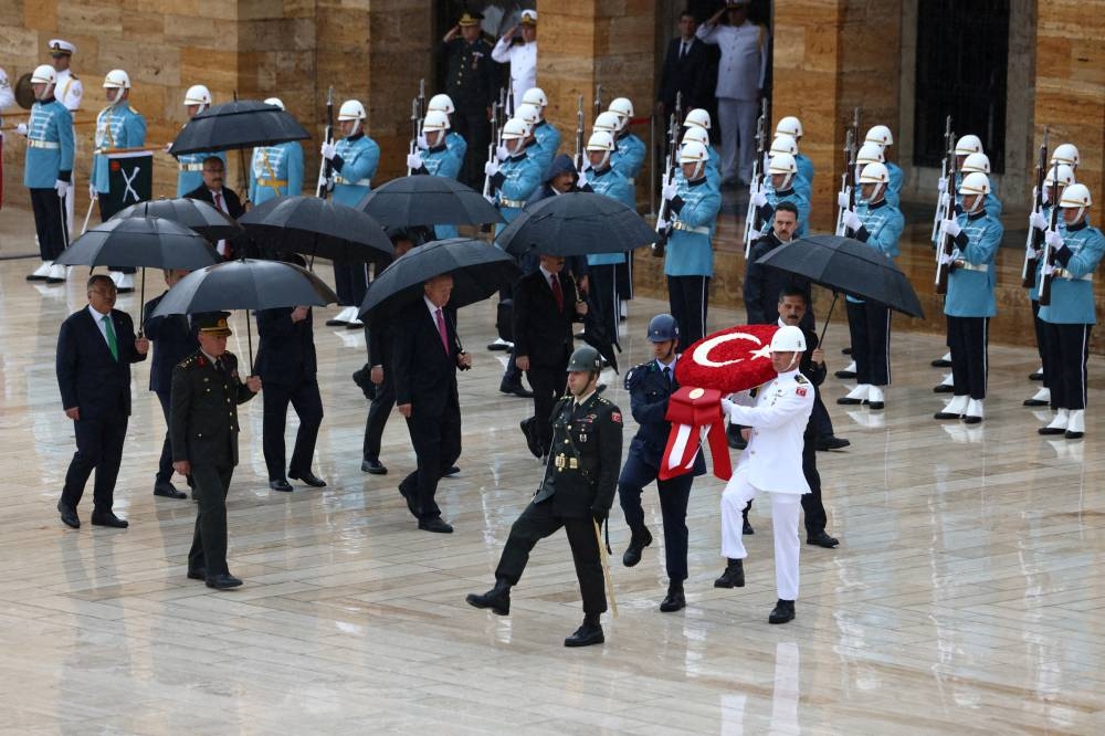 Turkish President Tayyip Erdogan visits the mausoleum of Mustafa Kemal Ataturk, founder of modern Turkey, after he takes oath in Ankara. REUTERS/Cagla Gurdogan