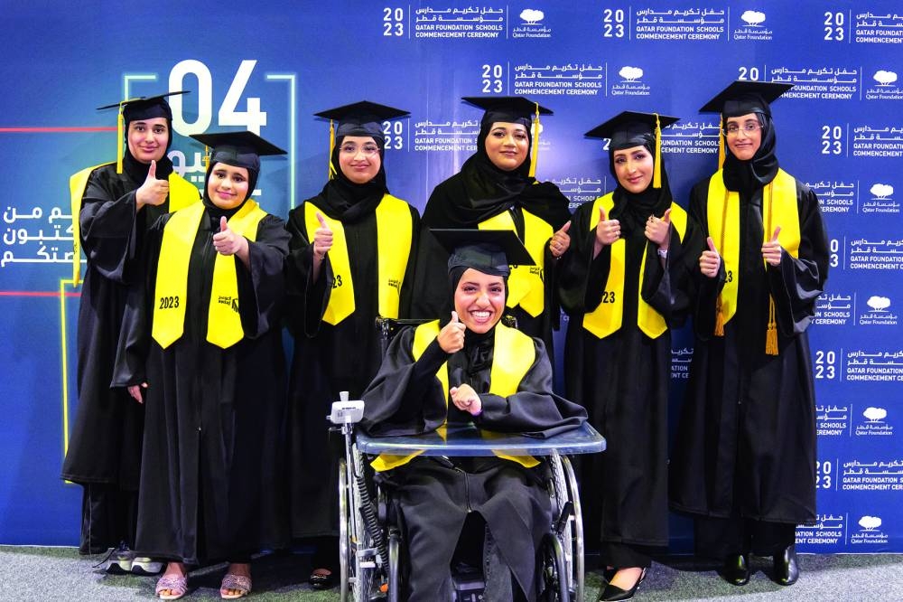 A group of students celebrating backstage.