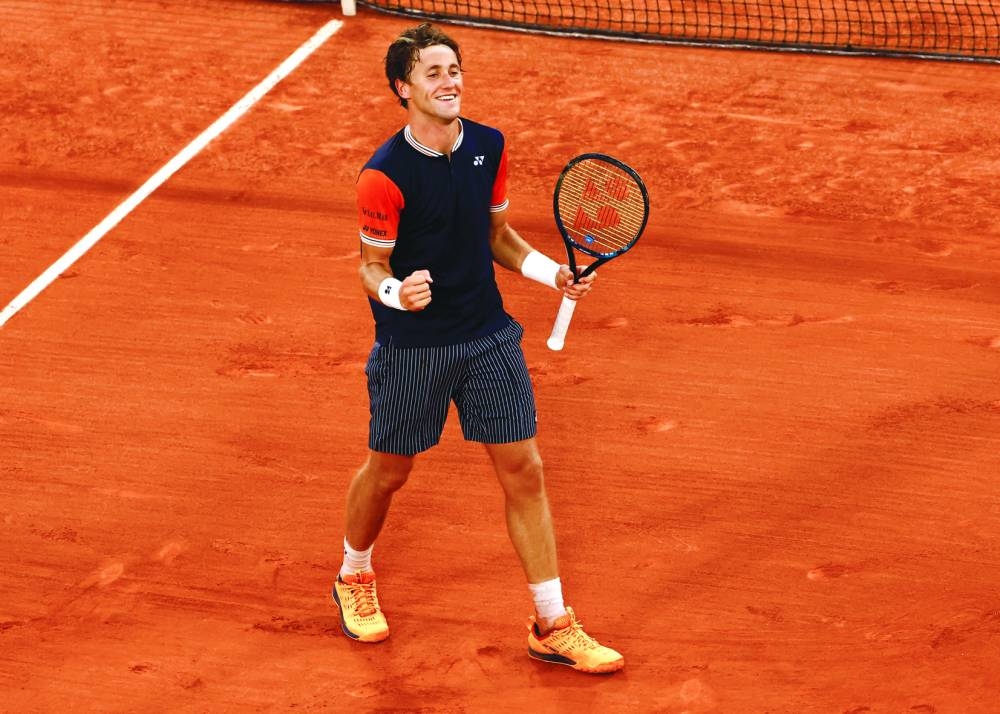 Norway’s Casper Ruud celebrates after winning his semi-final match against Germany’s Alexander Zverev on Friday. (Reuters)