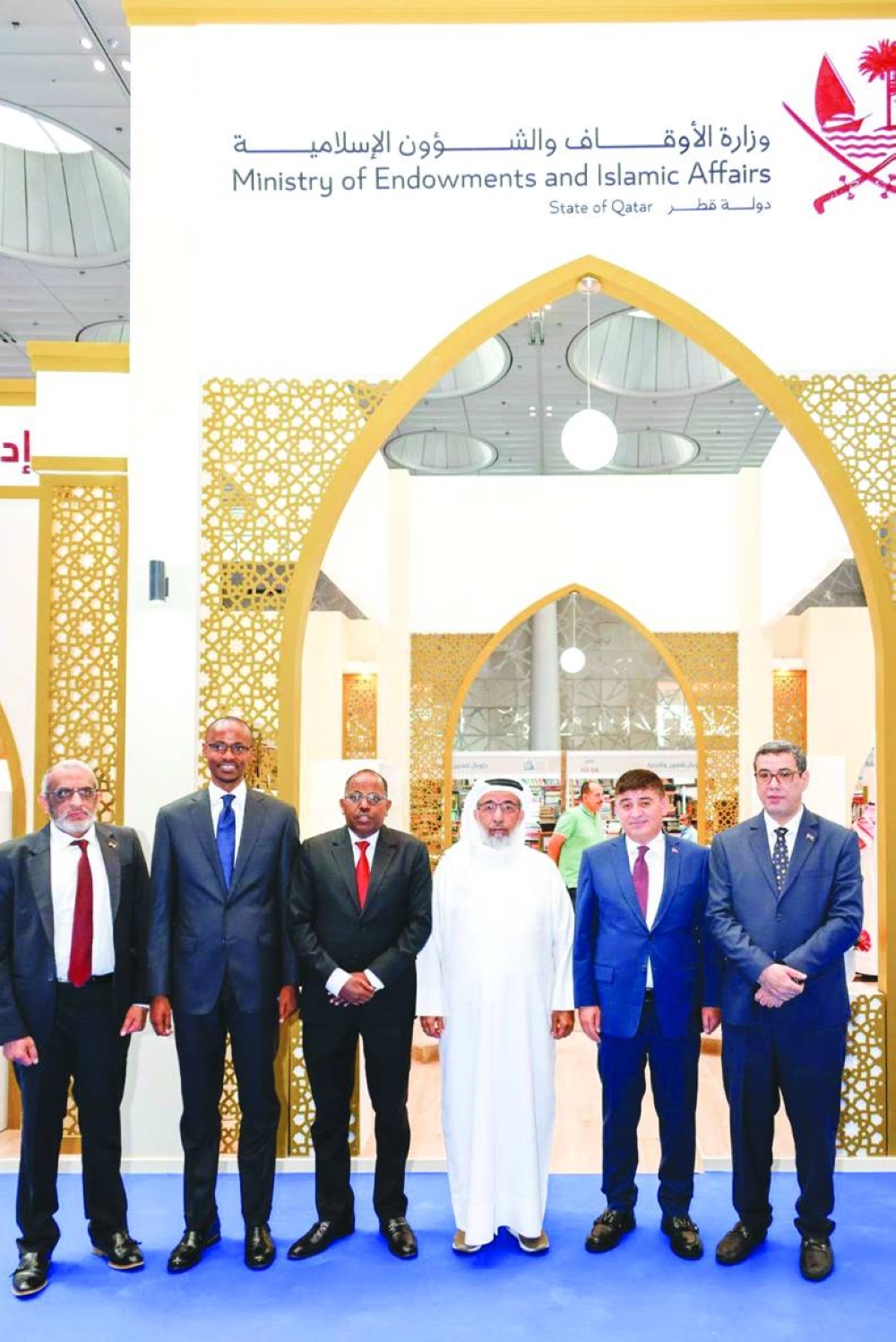 HE Ghanem bin Shaheen bin Ghanem al-Ghanem with other dignitaries at the Awqaf ministry's pavilion.