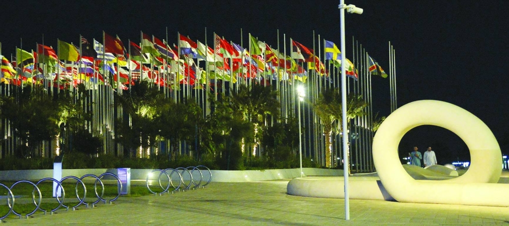 Flags at the Flag Plaza on Doha Corniche are seen fluttering in a mild breeze Friday evening. PICTURE: Shaji Kayamkulam.
