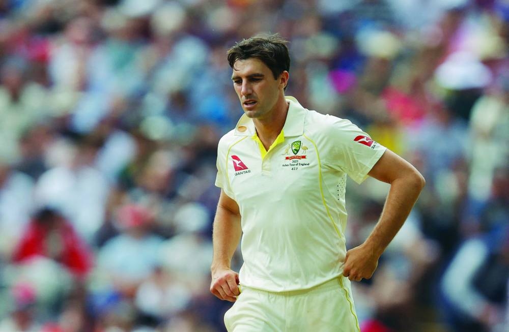 
Australia’s Pat Cummins walks back to his bowling mark on day three of the first Ashes Test in Edgbaston. (Reuters) 