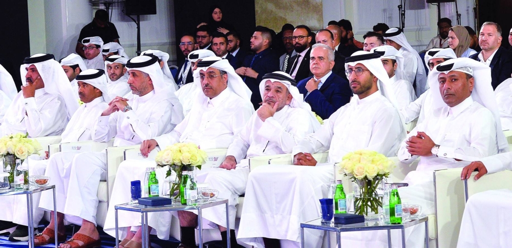 HE the Minister of Labour Dr Ali bin Samikh al-Marri, who is also Board Chairperson of Jusour, and other dignitaries at the ceremony.