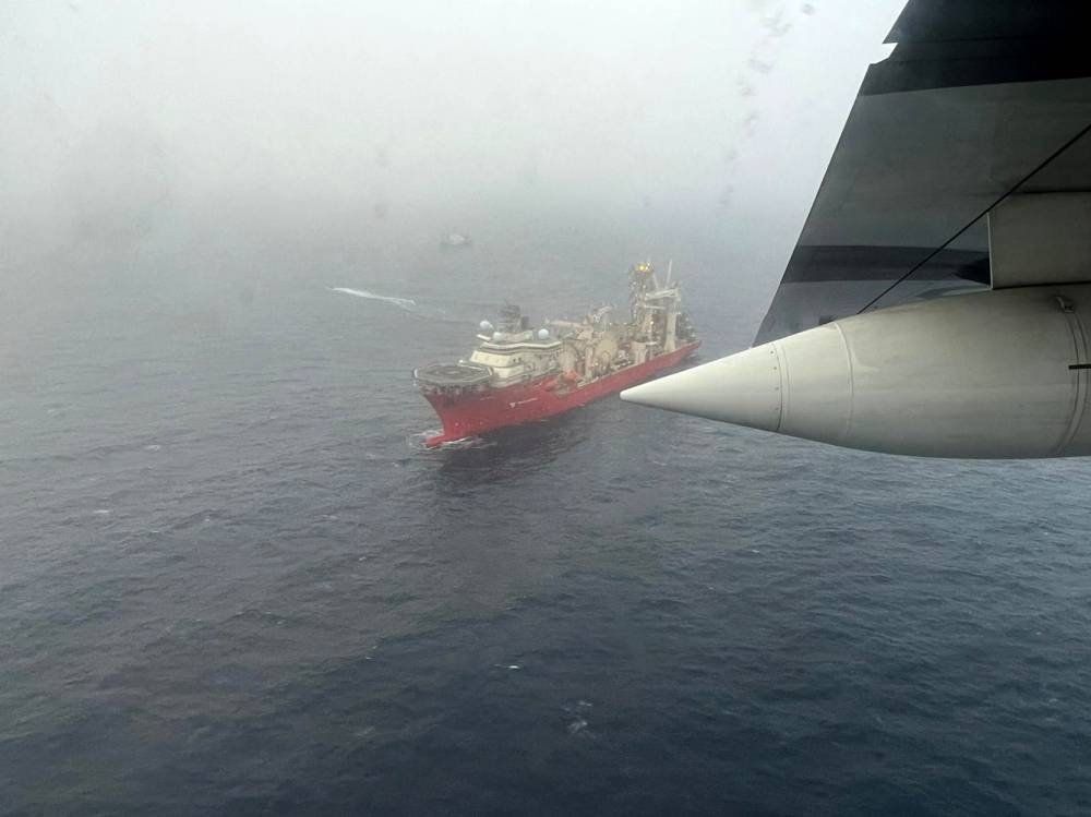 Aerial image obtained from the US Coast Guard, the ship Deep Energy sails in the search area for OceanGate's Titan submersible.  AFP / US Coast Guard