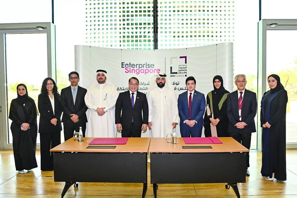 Officials of QRDI Council and EnterpriseSG during the signing of a strategic partnership agreement to stimulate cross-border collaboration and pioneering open innovation.