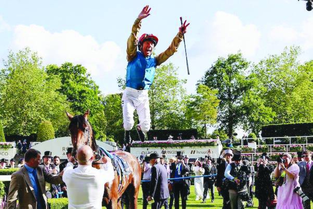 Italian Jockey Frankie Dettori celebrates after winning the Queen Vase group 2 race with the Wathnan Racing’s Gregory on the second day of the Royal Ascot horse racing meeting, in Ascot, west of London. PICTURE: Zuzanna Lupa