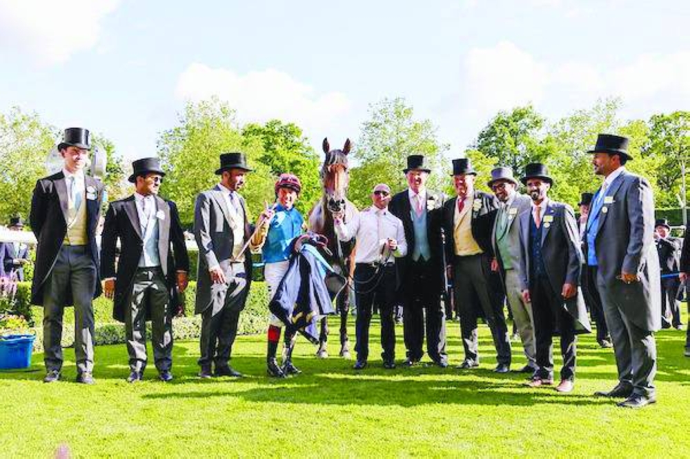 Italian Jockey Frankie Dettori celebrates after winning the Queen Vase group 2 race with the Wathnan Racing’s Gregory on the second day of the Royal Ascot horse racing meeting, in Ascot, west of London. PICTURE: Zuzanna Lupa