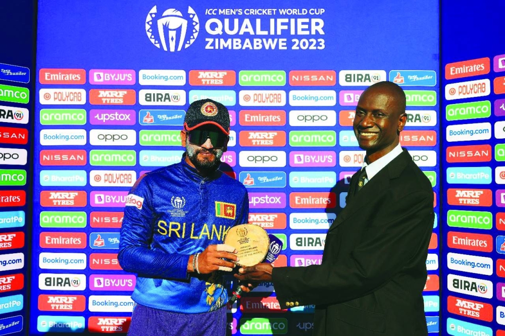 Dimuth Karunaratne receives the Man of the Match award for his knock of 103 after Sri Lanka’s win over Ireland in Bulawayo, Zimbabwe, on Sunday.