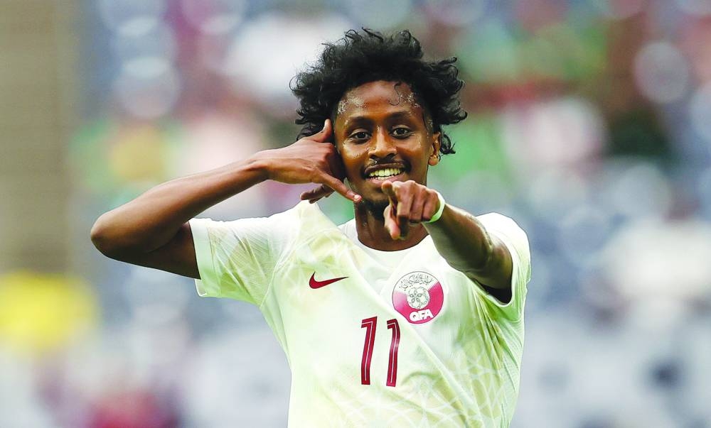 
Qatar’s Yusuf Abdurisag celebrates after scoring against Haiti. 