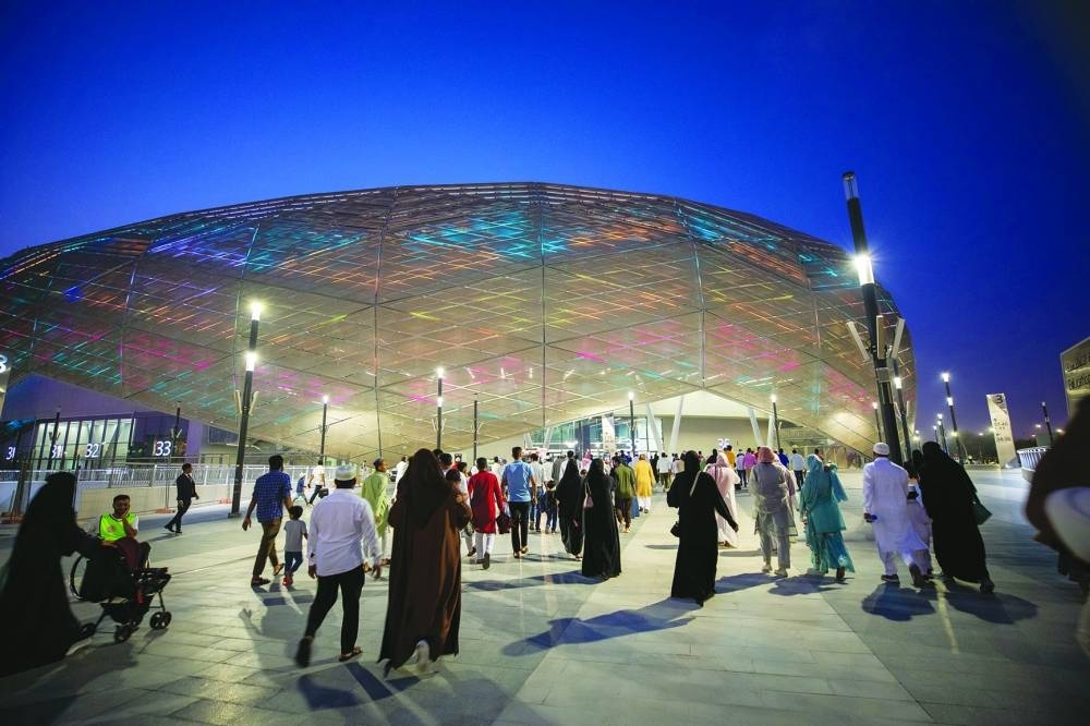 The faithful proceeding to QF's Education City Stadium before dawn yesterday for the Eid al-Adha prayers (supplied picture)
