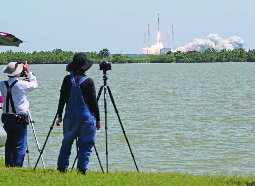 
Left: The European Space Agency (ESA)’s Euclid space telescope launches on a SpaceX Falcon 9 rocket from the Kennedy Space Centre in Cape Canaveral, Florida. 