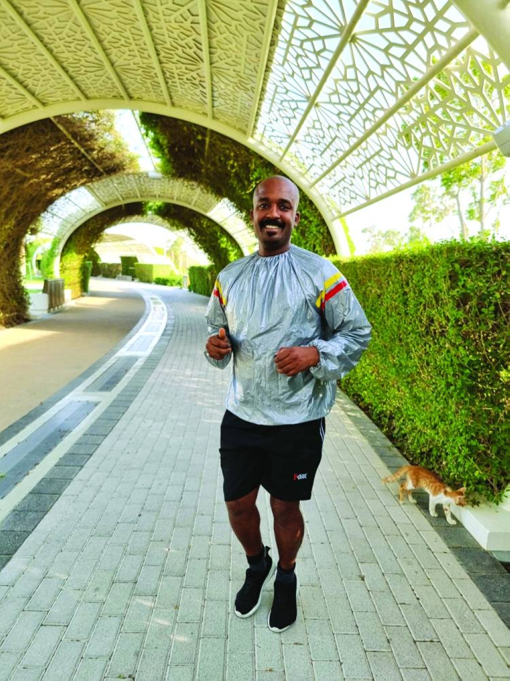 Adnan from Oman enjoys his daily running routine at Al Gharrafa Park's air-conditioned track Tuesday. PICTURE: Joey Aguilar