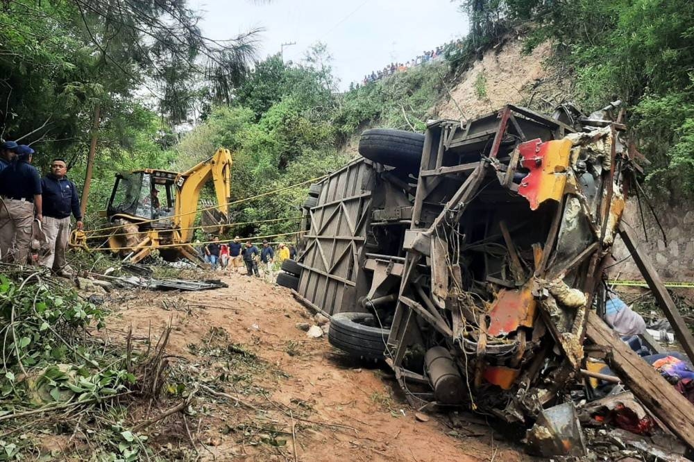 The remains of a bus after it plummeted into a ravine in the outskirts of Magdalena Peñasco, Oaxaca state, Mexico. Tlaxiaco Municipal Police / AFP