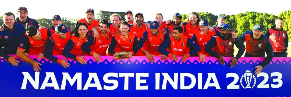 The Netherlands cricket team celebrates qualifying for the 2023 ICC World Cup after their win against Scotland in Harare, Zimbabwe, on Thursday.