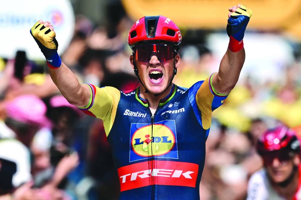 
Lidl-Trek’s Danish rider Mads Pedersen celebrates as he crosses the finish line to win 8th stage of the 110th edition of the Tour de France cycling race in Limoges, France, yesterday. (AFP) 