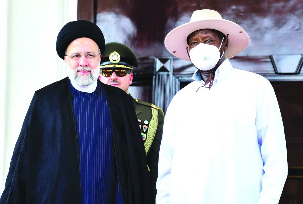 Kenya’s President William Ruto and Iran’s President Ebrahim Raisi attend a joint press conference at the State House in Nairobi. Below: Iran’s President Raisi poses for a photograph with Uganda’s President Yoweri Museveni during his three-country African tour,  at the State House in Entebbe, Uganda, yesterday.