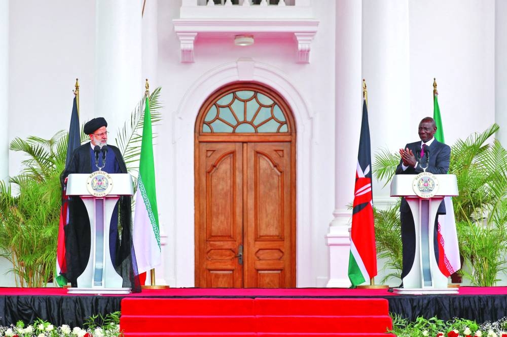 Kenya's President William Ruto and Iran's President Ebrahim Raisi attend a joint press conference at the State House in Nairobi.