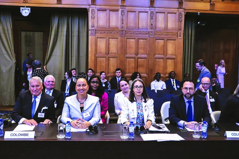 Representatives of Colombia sitting before the ICJ as it gives its verdict over an oil and fish-rich swathe of the Caribbean Sea, in The Hague, yesterday. (AFP)